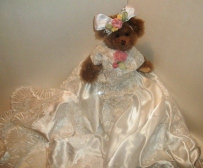 Beautiful Teddy Bear with vintage material satin gown