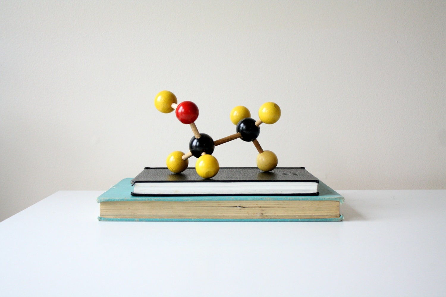 vintage. molecule model. ethyl alcohol. red. black. yellow. shelf decor. science. biology. nerd.