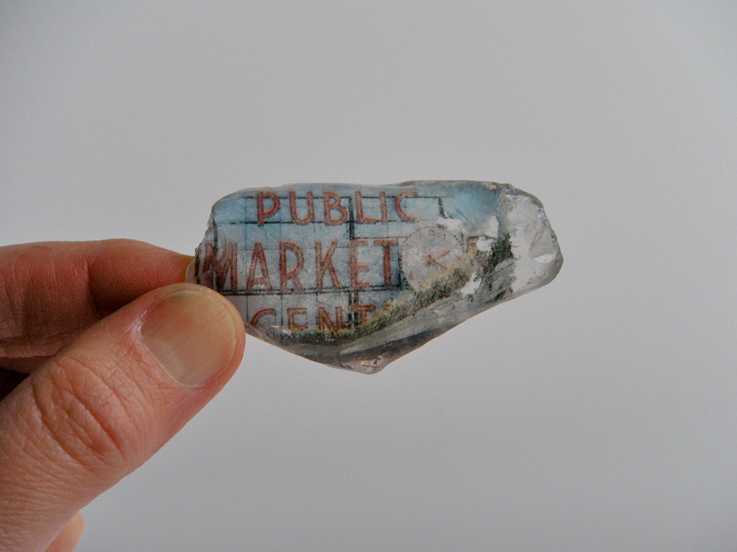 seattle's public market - image on beach glass, weathered and natural
