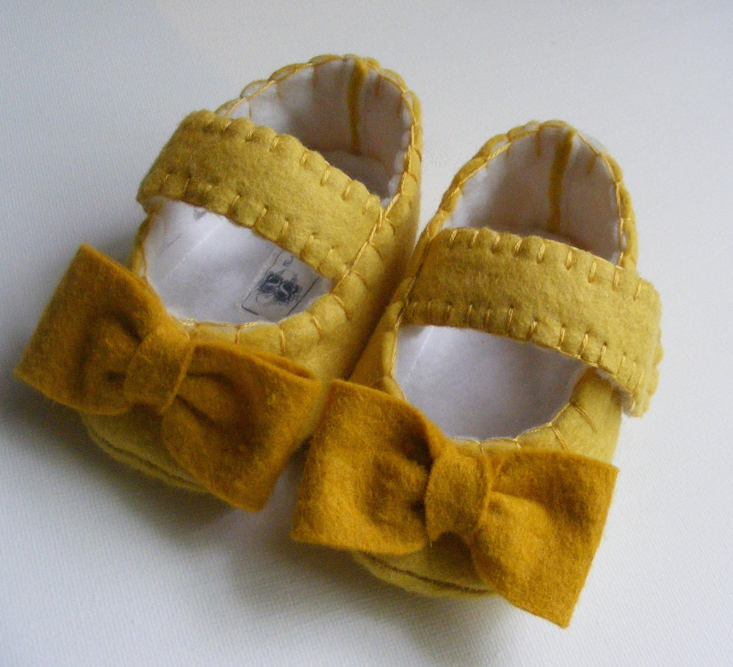 Sunny Yellow Felt Baby Shoes with Mustard Bows