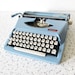 vintage Royal Parade typewriter / mid century baby blue manual portable typewriter with case