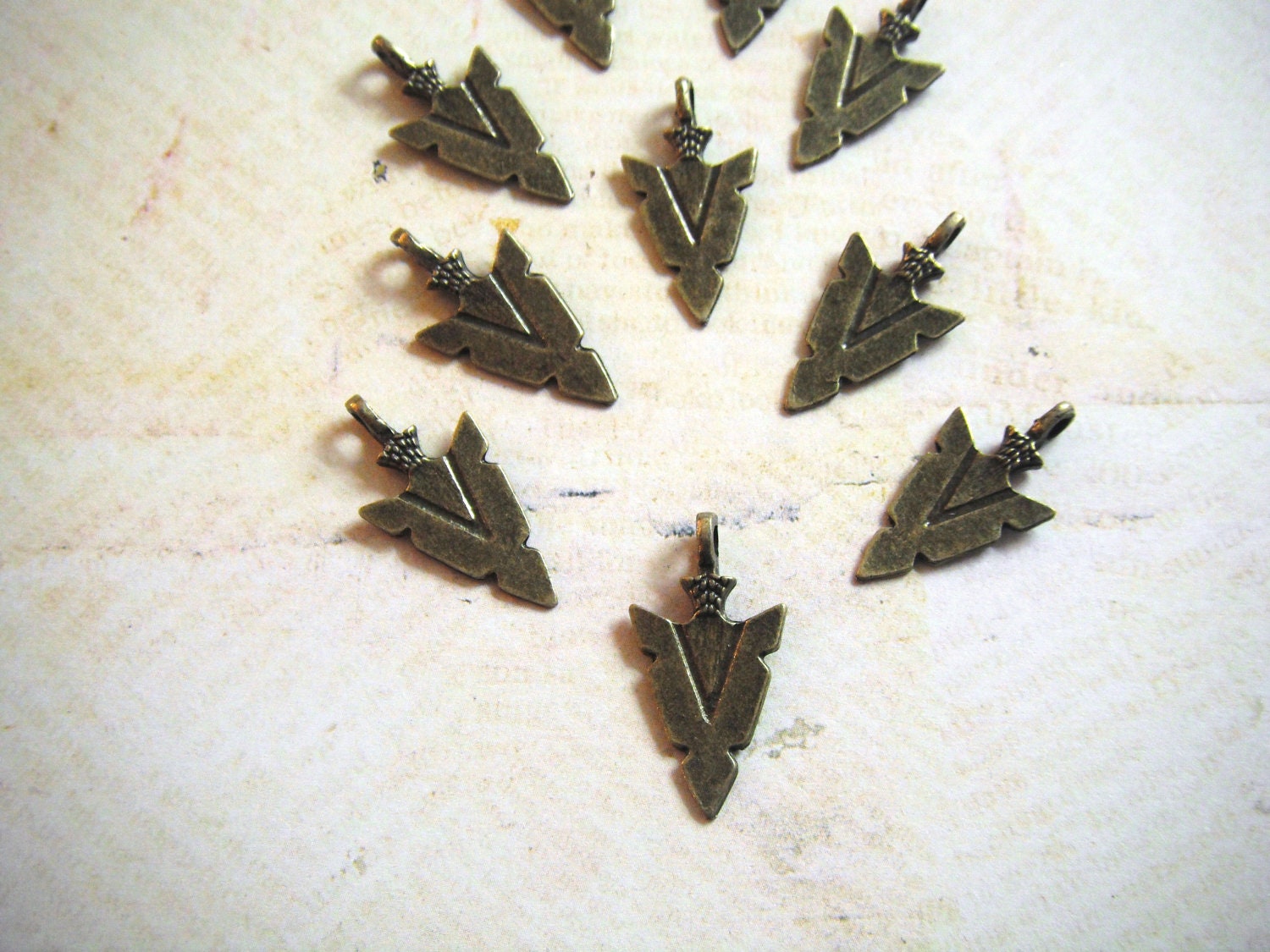 Antique Brass Arrowhead Charms, Double Sided,  Pack Of 10 Charms.