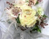 bridal bouquet of  rhinestones  brooches silk satin hand twisted rosettes and lace yellow cream