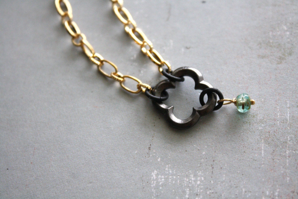 Arm Candy - small black quatrefoil clover flower with sea green bead charm gold chain bracele - gifts under 15