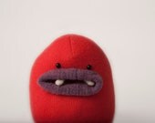 Doris the handmade plush monster from upcycled sweaters