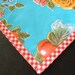 48x48 Oilcloth Tablecloth Lemons and Roses Light Blue with Red Gingham Trim