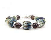 Blue Brown Green Elephant Sterling Silver Lampwork Bracelet: Elephant Walk - Thebracelettree Blue Brown Green Elephant Sterling Silver Lampwork Bracelet: Elephant Walk - Thebracelettree