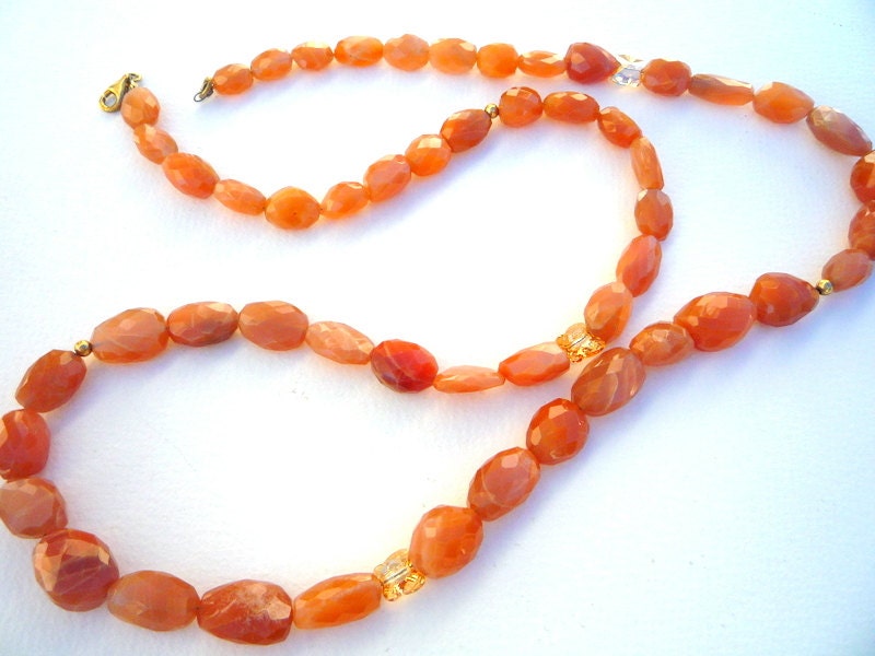 Peach Moonstone faceted nugget long necklace with golden Swarovski butterflies.