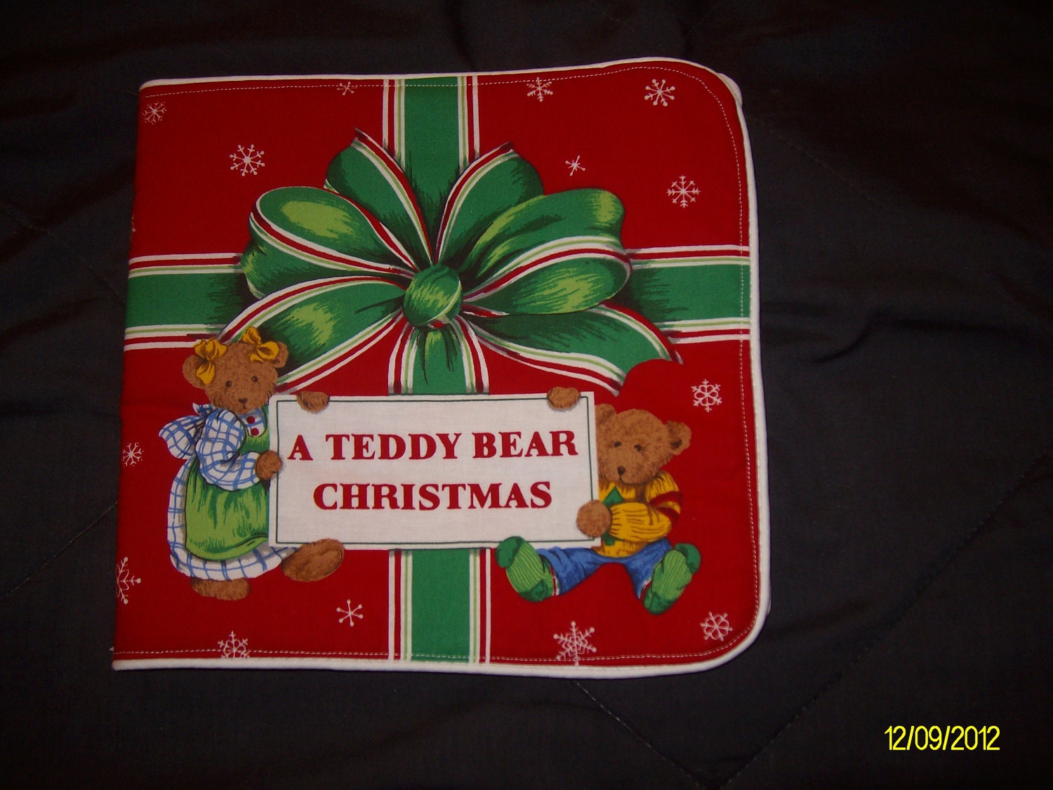 A Teddy Bear Christmas Soft Cloth  Book                   in bright bold colors and piping around the edges
