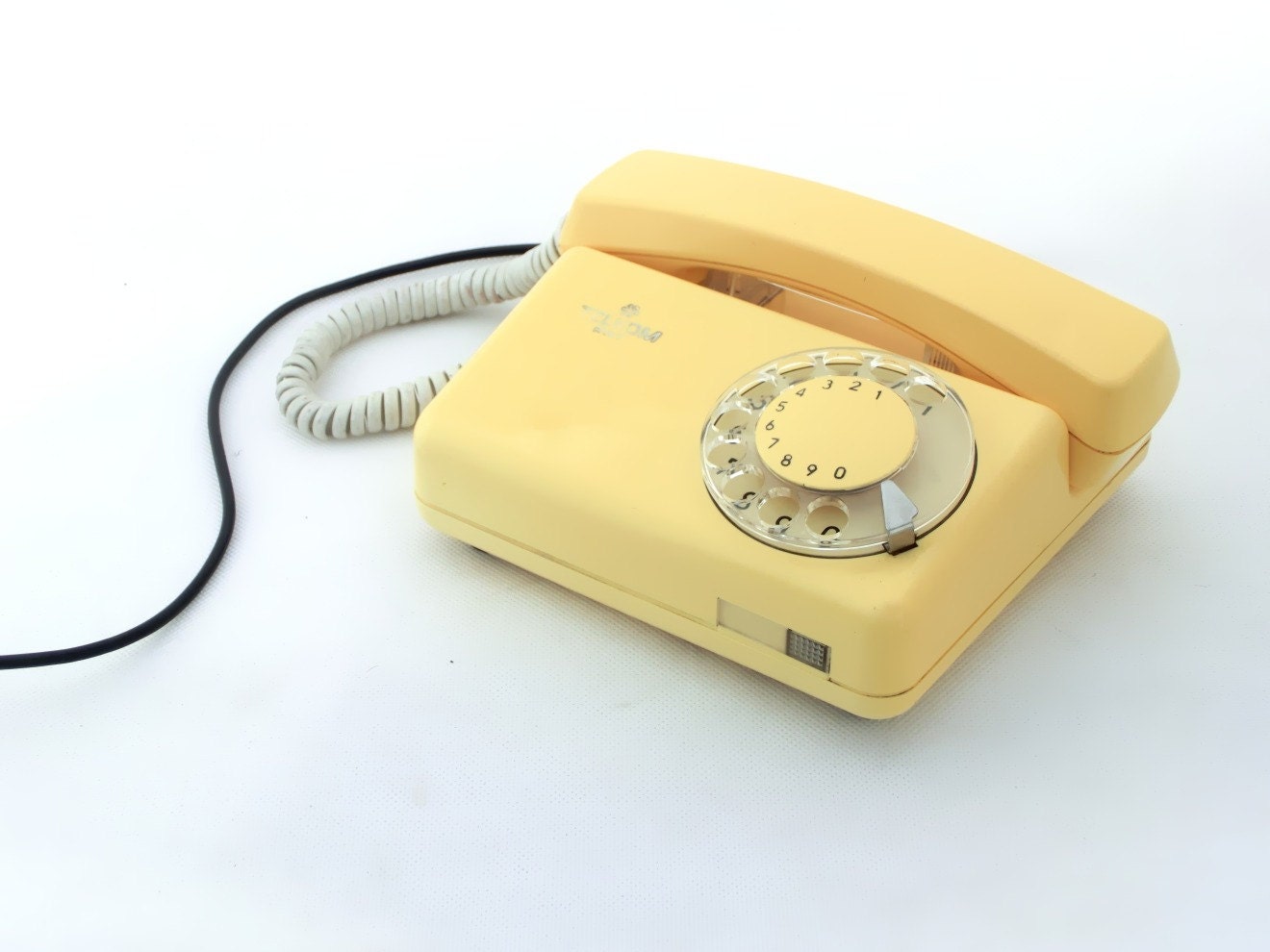 Vintage yellow vanilla rotary telephone 70s