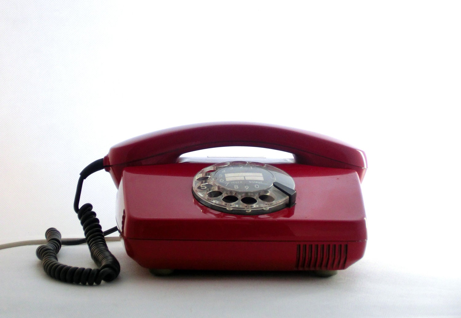 vintage red rotary telephone 80s
