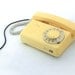 Vintage yellow vanilla rotary telephone 70s