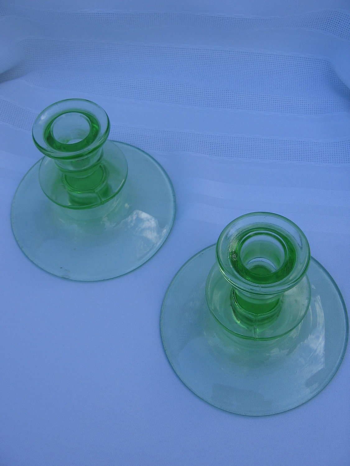 green depression glass candle holders set by Bryansfinds on Etsy
