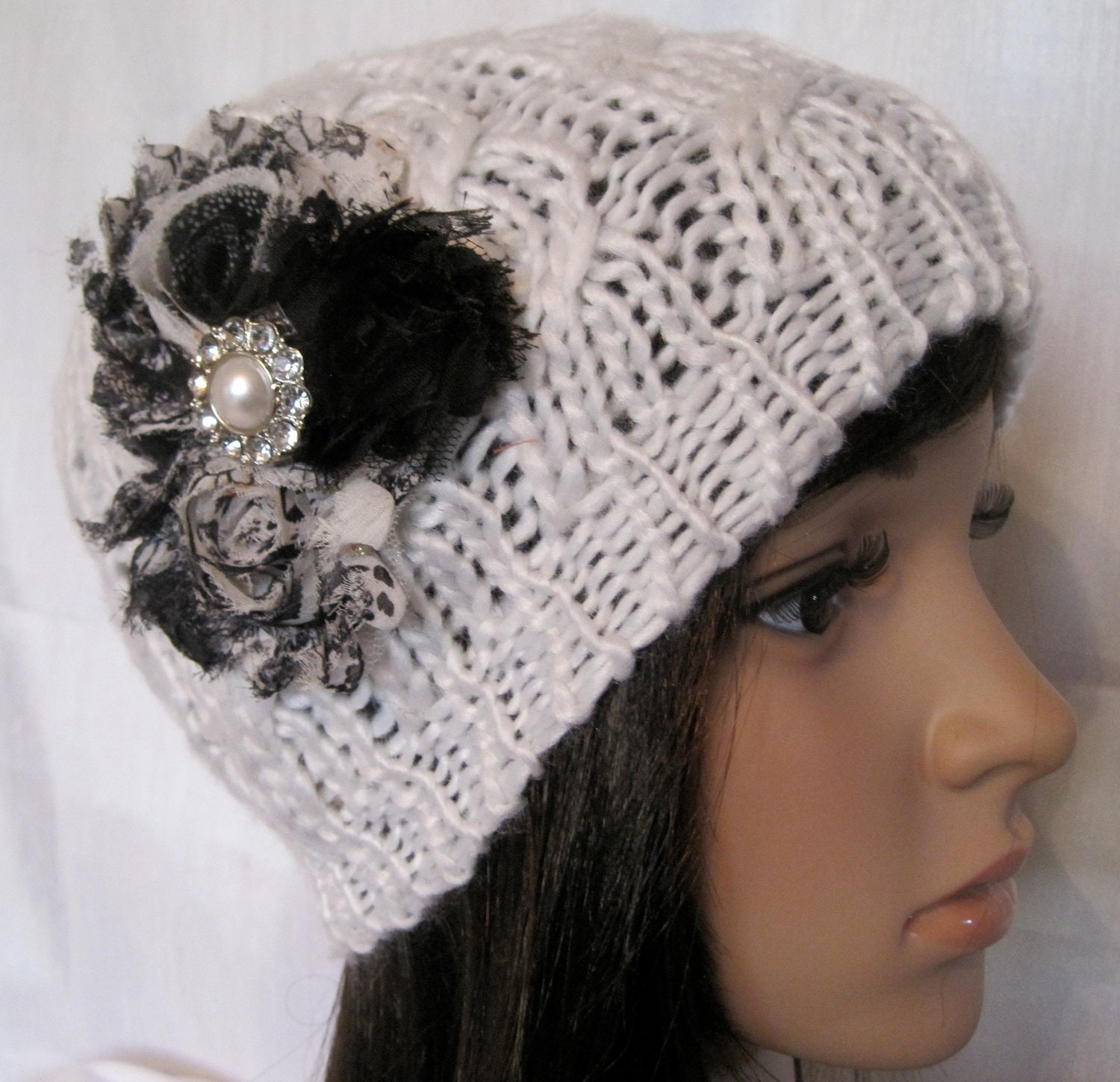 White Cable Knit Beanie with Black and White Print Shabby Frayed Flowers and a Pearl and  Rhinestone Embellishment
