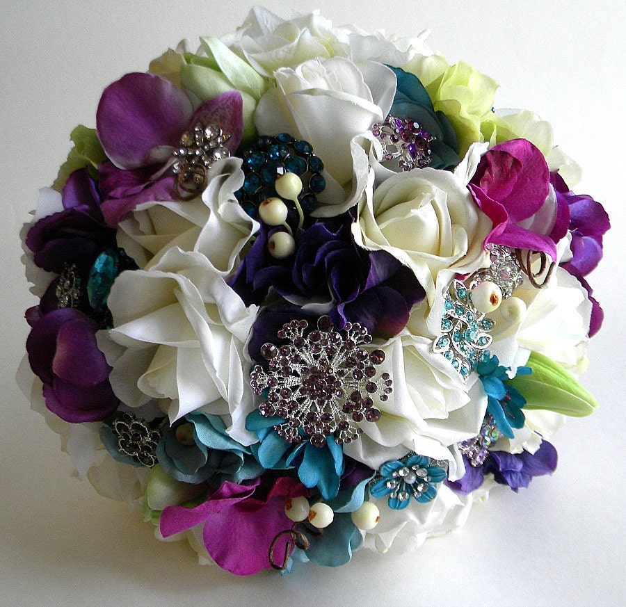 Exquisite Jewel Toned Brooch Studded Bridal Bouquet with Real Touch Flowers In Teal and Purple