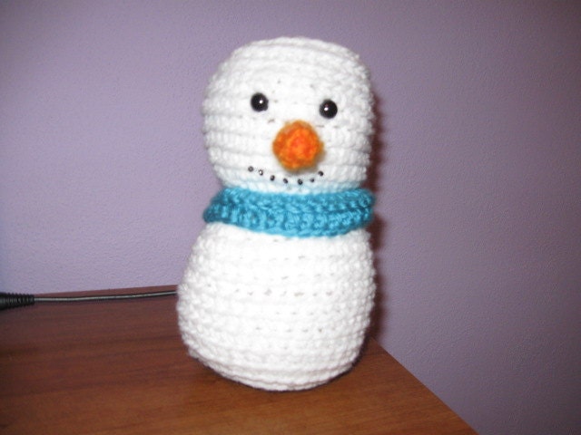 Snowman with blue scarf