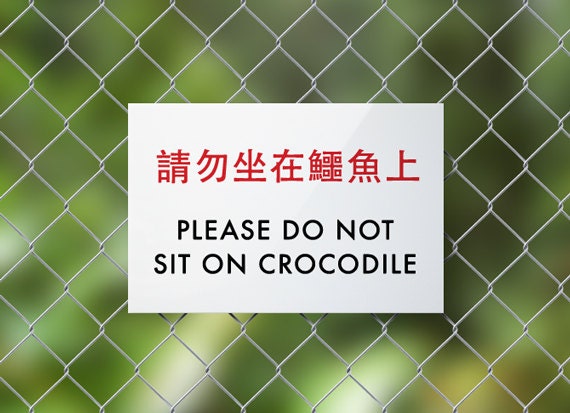 Funny Chinglish Sign Fail. Do Not Sit On Crocodile