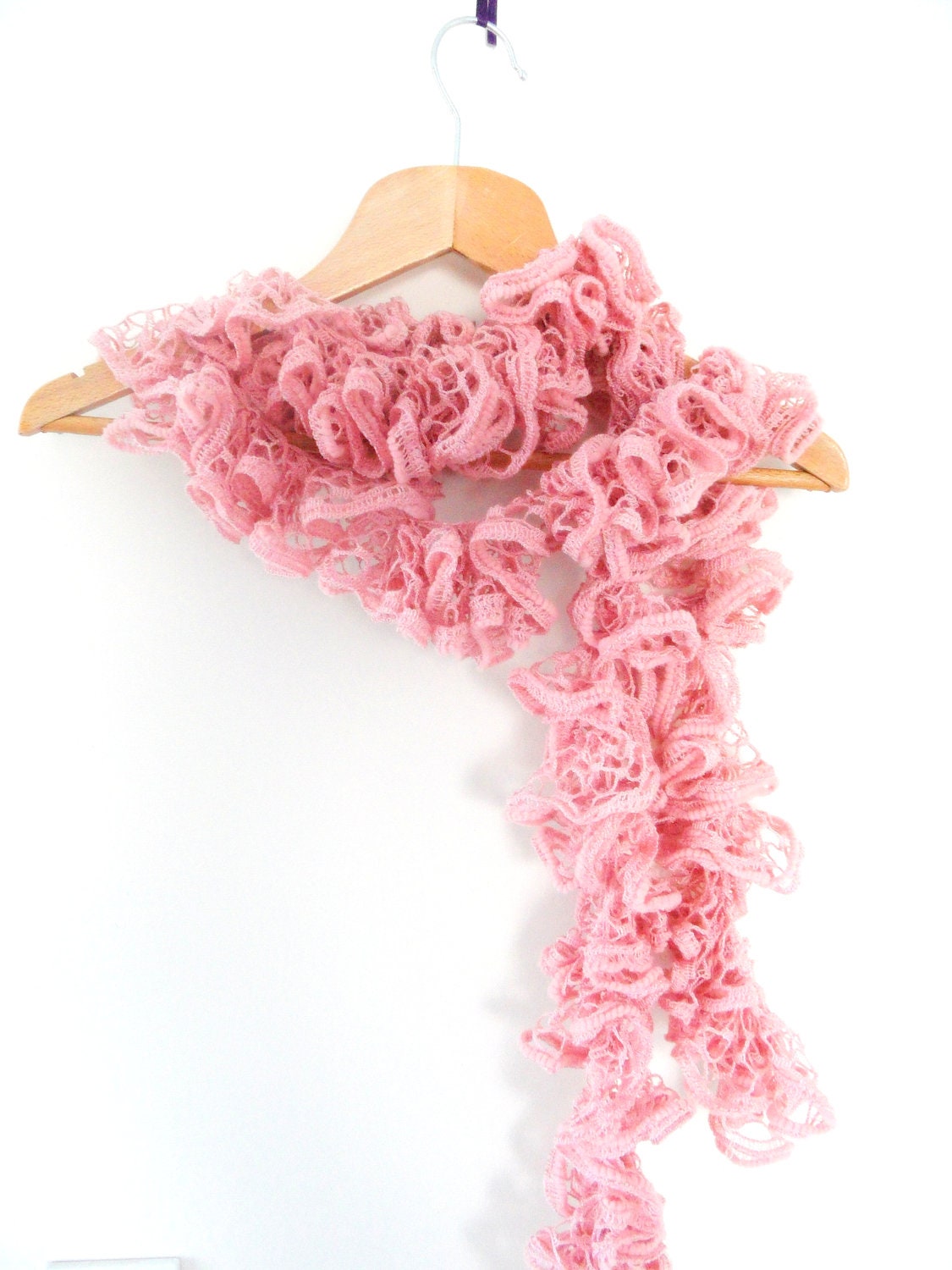 women and young girls in frilled pink scarf, knit scarf.