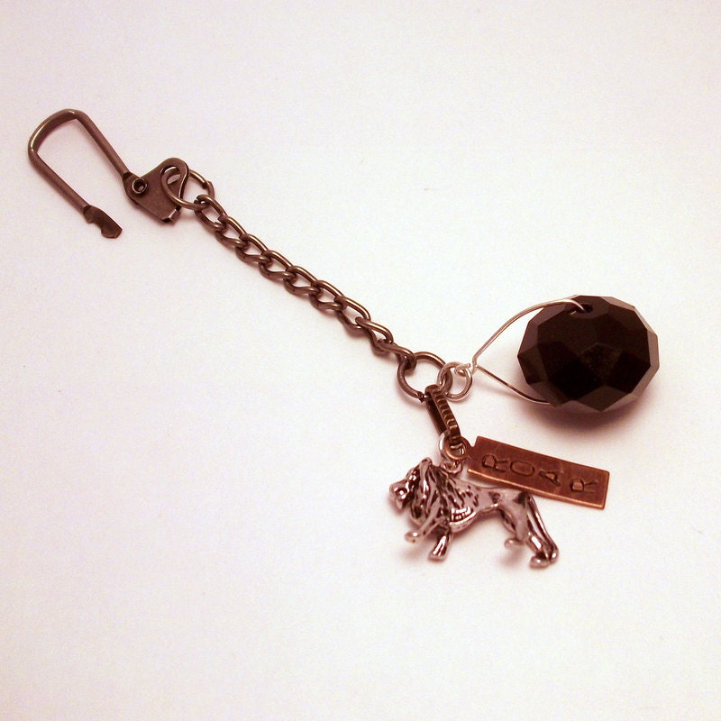 Keychain with a Black Glass Gem, a Pewter Lion Charm and a Brass Stamp "ROAR"