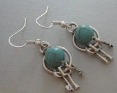 Key chain Charms. Beaded Earrings. Handmade silver Key chain with turquoise bead Earrings on silver ear wires. Necklace available too.