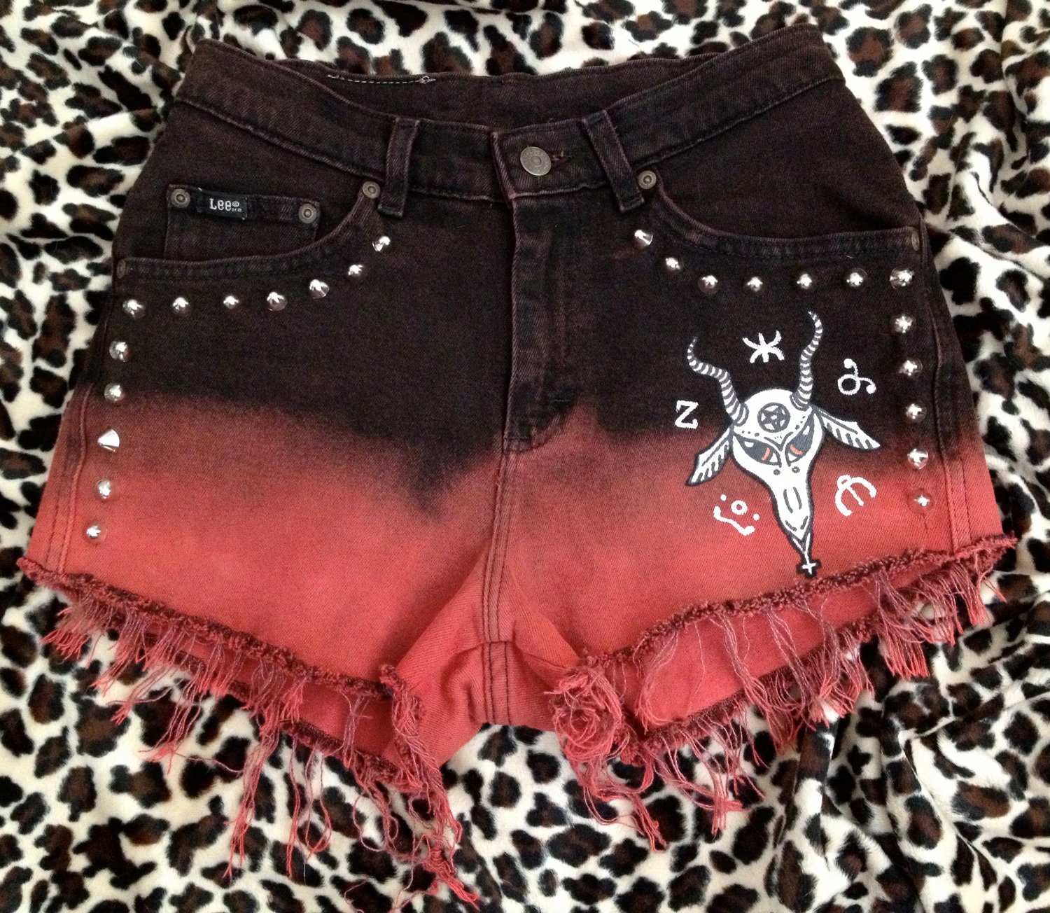 High-waisted recycled dyed studded denim w/ painted baphomet