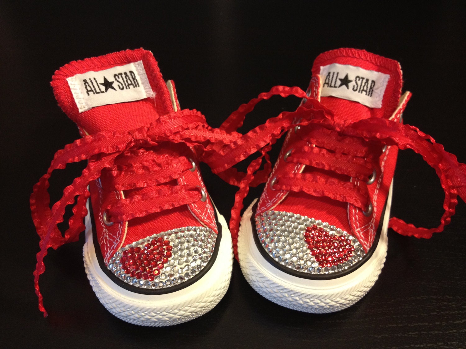 converse with red hearts on them