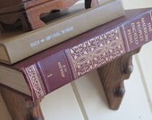 floating shelf made with vintage books. literally a book shelf. :)