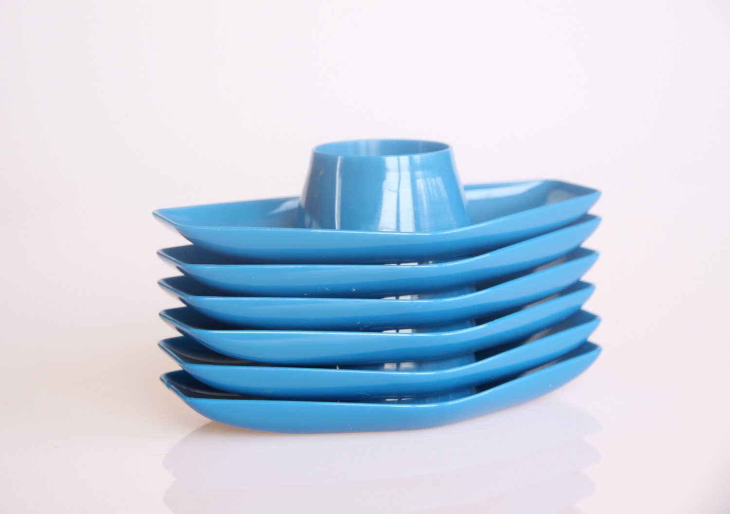 Set of 6 Belgian blue plastic egg cups from the seventies