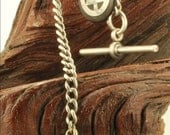 Impressive vintage 13in. graduated link silver straight style pocket watch chain, dark brown resin & silver inlay fob