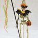 Halloween Skeleton with Costume on Wooden Spool
