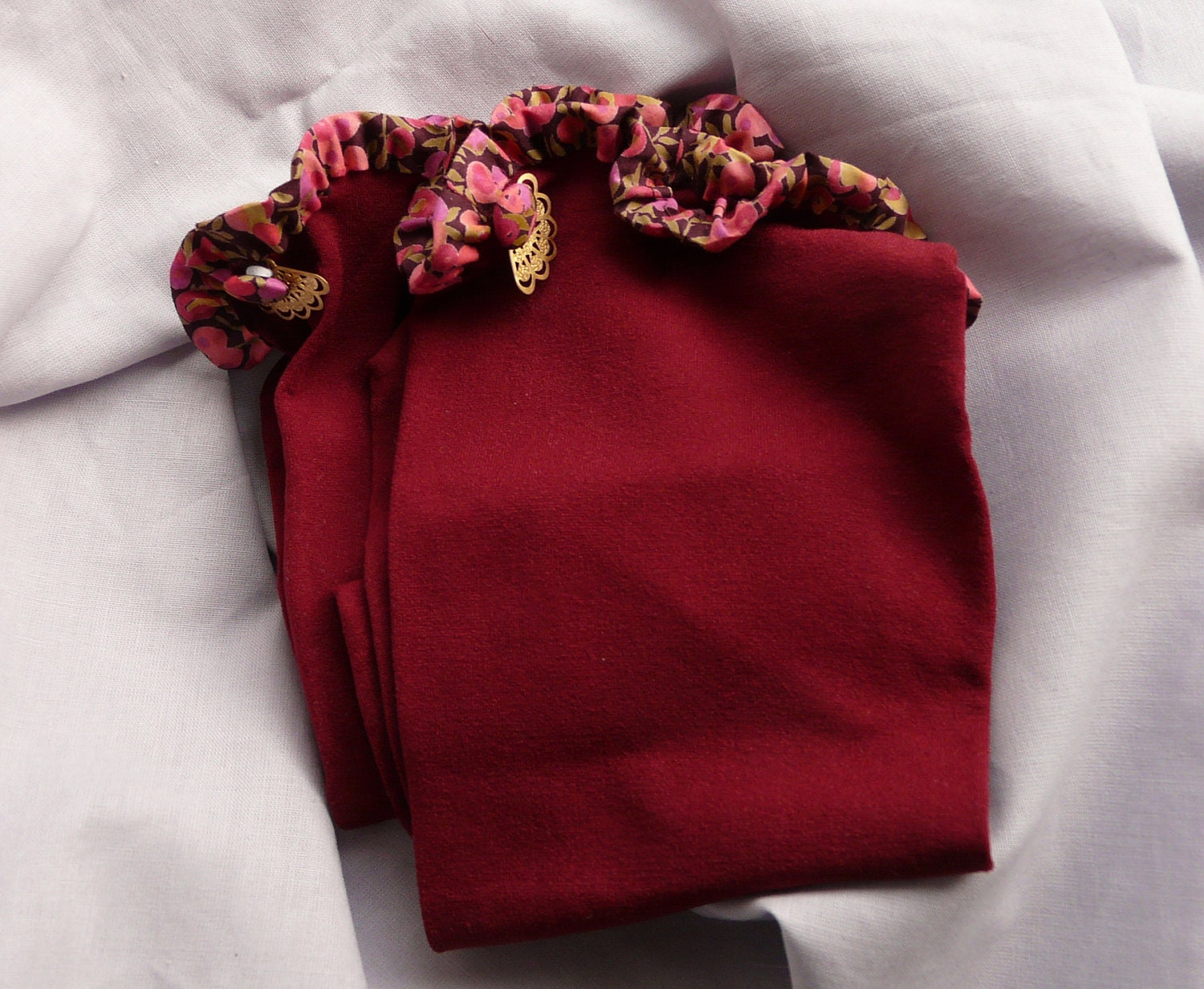 Burgundy stockings with Liberty garter, with a little matching button and golden fan ornament