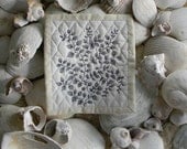 innocent, small machine stitched art quilt