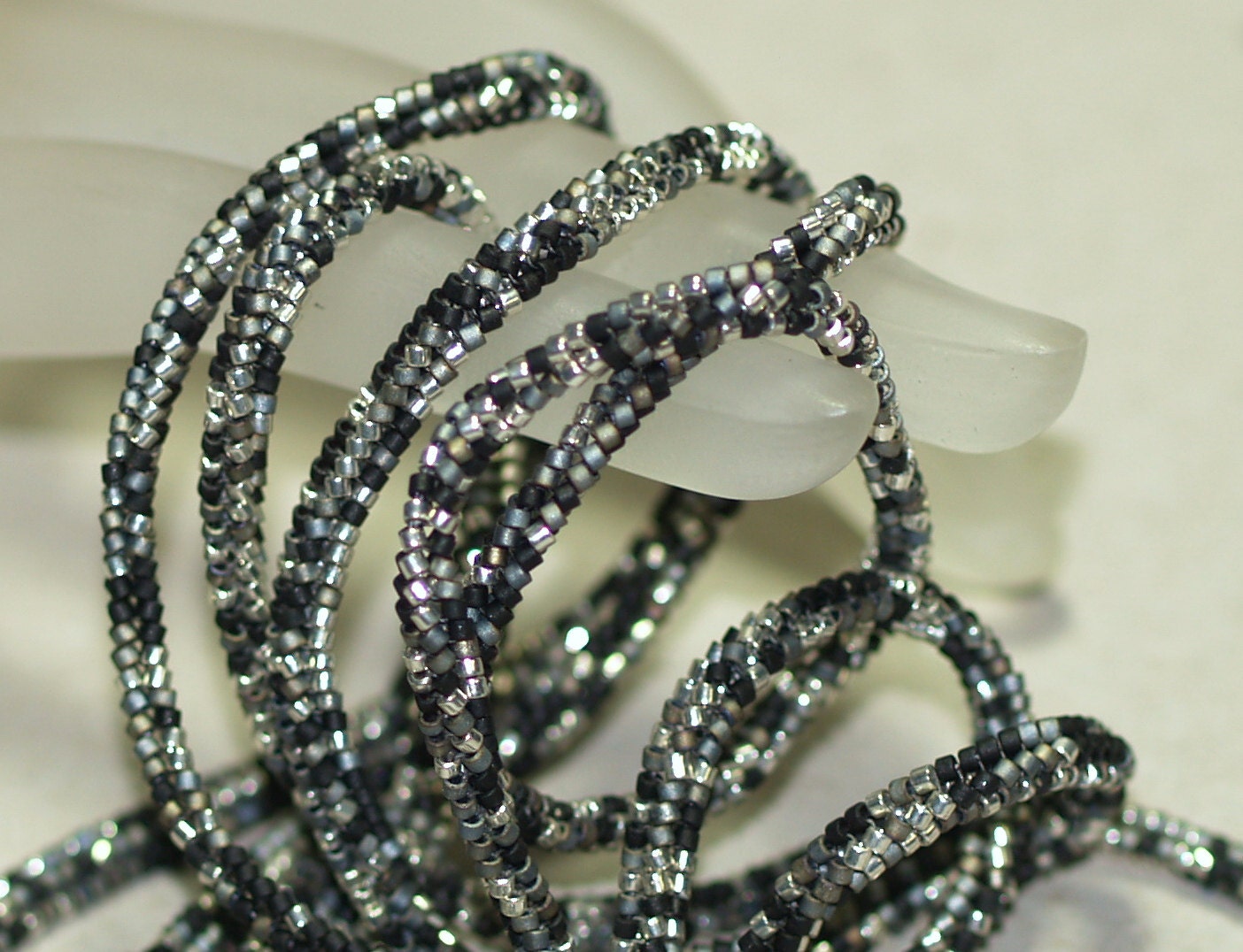 Shadowplay ... Necklace . Ndebele Rope . Black . Carbon Steel . Silver . Metallic . Tweed . Classic Look . Wrap Bracelet . Infinity