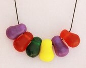 Rich purple, orange and kelly green butternut beads adjustable resin necklace