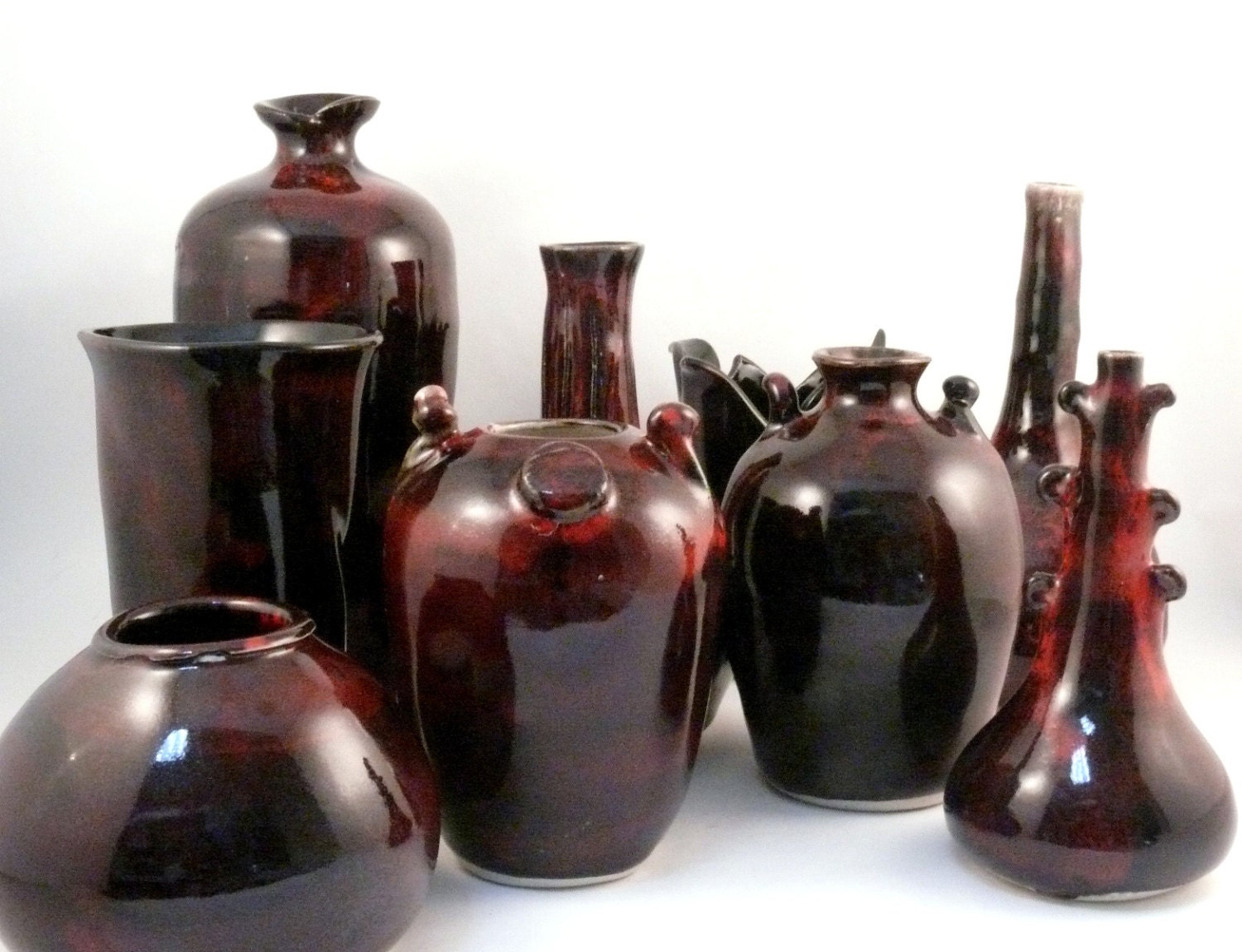Handmade Ceramic Sculpture vase / Art Vessel in chocolate cherry glaze