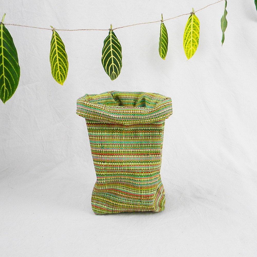 Tall pot made of tree bark fabric, jungle