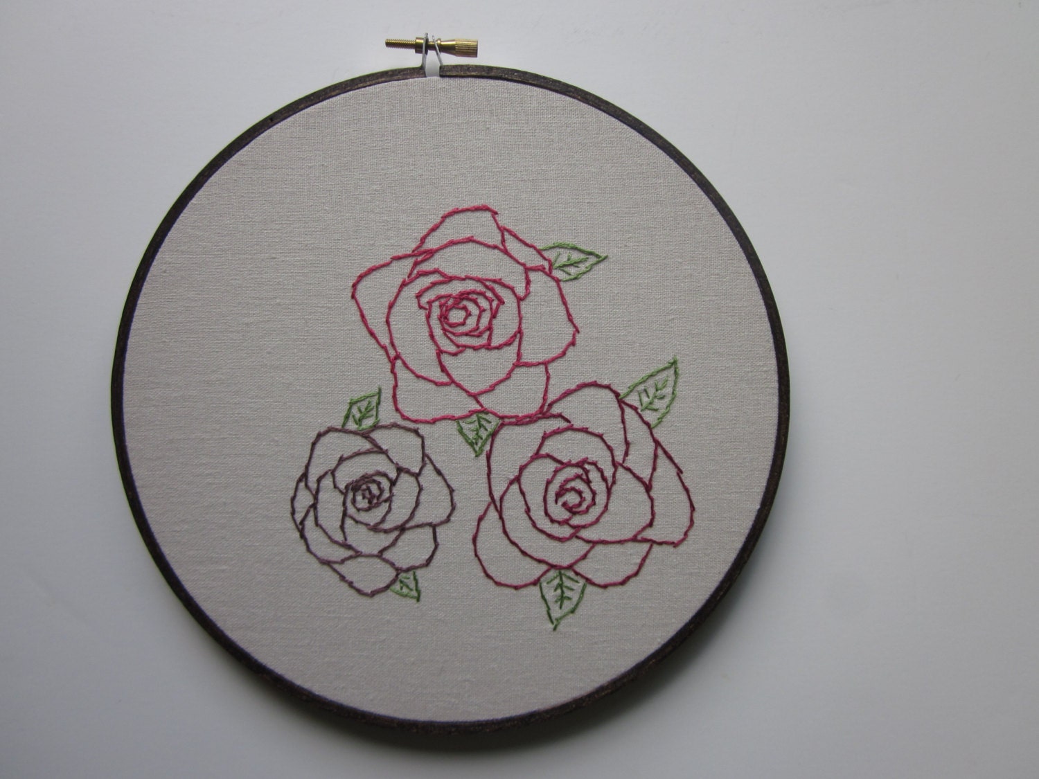 roses in the round - hand-embroidered and framed in the hoop