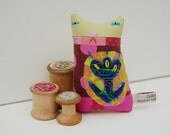 A small ornamental textile kitten called Polly