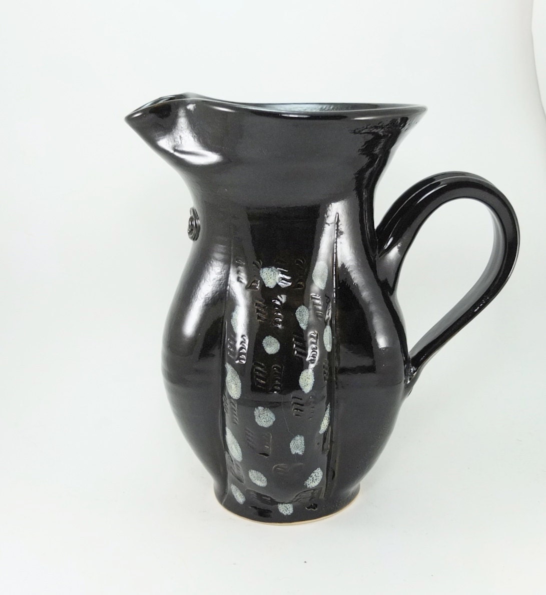 pretty black and patterned pitcher