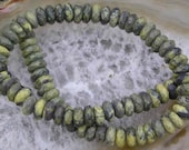 CLEARANCE..Yellow, green turquoise stone faceted 10mm rondell beads..16 inch strand.