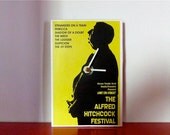 Alfred Hitchcock postcard clock