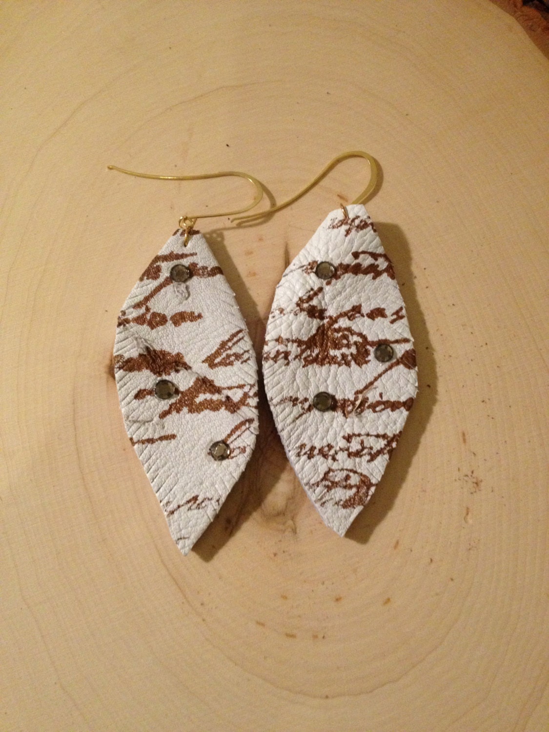 Leather feather white earrings