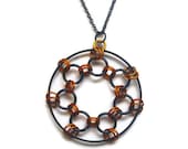 Black and Orange Spirograph Necklace