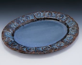 Blue Platter with Green/Brown Highlights and a Nautilus Stamp Design
