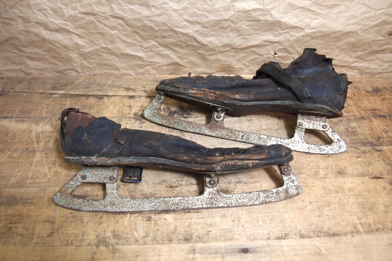 Pair of old vintage leather victorian ice skates black