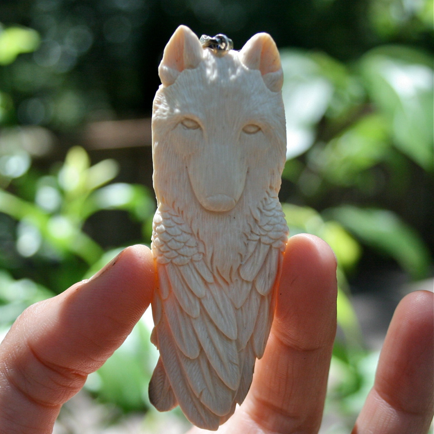 Carved Fossil Wolf Eagle Spirit Totem Pendant