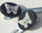 small white butterflies on black oval hand made hair clips set of 2