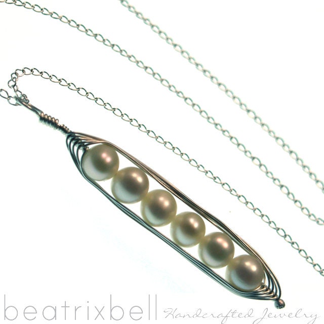 sterling silver pea pod necklace with six peas