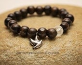 Free Bird peace dove wood beaded stretch bracelet