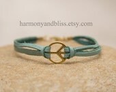 Turquoise gold peace sign bracelet